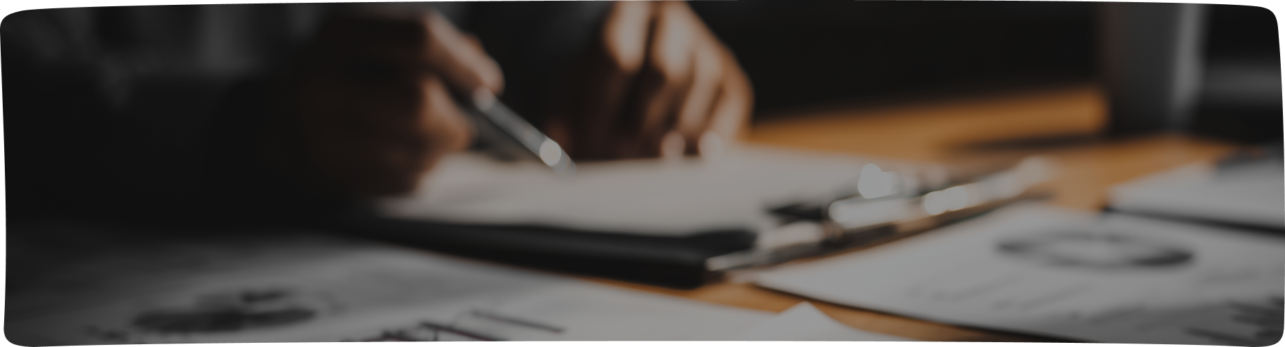 Hands reviewing a financial report with a calculator